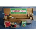 A Modern Boxed Croquet Set by Jaques for Four Players with Hoops, Mallets, Balls and Booklet