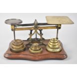 A Set of Late 19th Century Brass Postage Scales with Various Graduated weights on Serpentine
