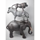 A Modern Resin Study of African Wildlife, Tower Consisting of Elephant, Zebra and Lion, 47cms High