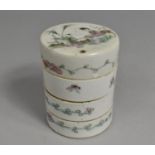 A 19th Century Chinese Porcelain Four Tier Box Decorated with Maiden and Child in Garden Setting,