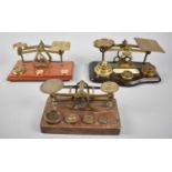 One Reproduction and Two Vintage Brass Postage Scales, Wooden Plinths