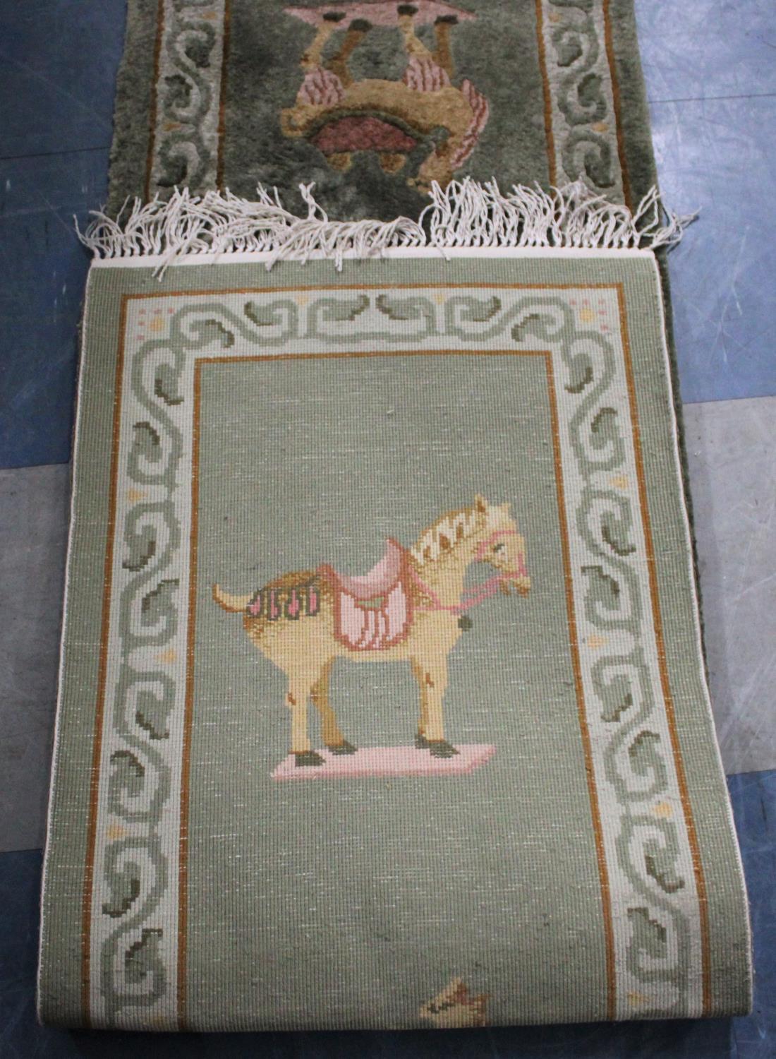 A Narrow Patterned Runner Decorated with Camels and Horses, 208x47cms - Image 2 of 2