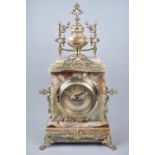 A Mid 20th Century Brass and Onyx Mantel Clock with Battery Movement, 45cms High