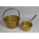 A Large Brass Jam Kettle, 31cms Diameter, Together with a Brass Saucepan with Iron Handle, 21cms