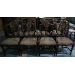 A Set of Eight Wheatsheaf Shield Back Dining Chairs to include Two Carvers