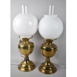 A Near Pair of Mid 20th Century Brass Table Lamps in the Form of Oil Lamps, Opaque Glass Shades