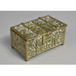 A Cast Brass Casket decorated with Medieval Scenes, 14.5cms Wide