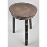 A Vintage Circular Topped Three Legged Stool with Pokerwork Decoration, 26cms Diameter