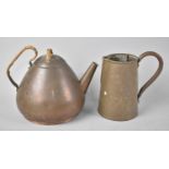 A German Arts and Crafts Copper Teapot and a Brass Jug