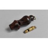 A Miniature Gilt Whistle Charm and a Hardstone Larger Example