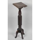 A Mid 20th Century Stained Oak Torchere Stand with Ribbed Rectangular Supports, 77cms High