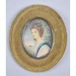 A Mid 20th Century Oval Framed Miniature Portrait of a Maiden
