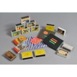 A Collection of Various Seiffen Matchbox Miniatures, Walt Disney Moving Picture Flip Books,