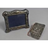 A Silver Framed Photo Frame Together with a Silver Book Cover, Condition issues