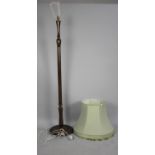 A Mid 20th Century Mahogany Standard Lamp with Reeded Column Supports
