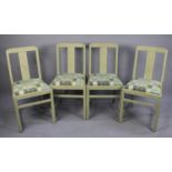 A Set of Four Painted Ercol Dining Chairs