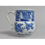 An 18th/19th Century Porcelain Blue and White Tankard Decorated in a Floral Motif, Missing Cover and