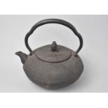 A Heavy Circular Cast Iron Oriental Teapot with Seal mark under Spout, 17cms Diameter