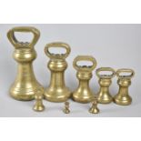 A COllection of Eight Late 19th/Early 20th Century Brass Bell Weights Ranging Half Ounce to Seven