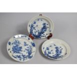 Three Japanese Porcelain Blue and White Plates Two Decorated with Blossoming Flowers and the Other