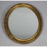 A Mid 20th Century Moulded Gilt Framed Oval Wall Mirror, 54x44cm