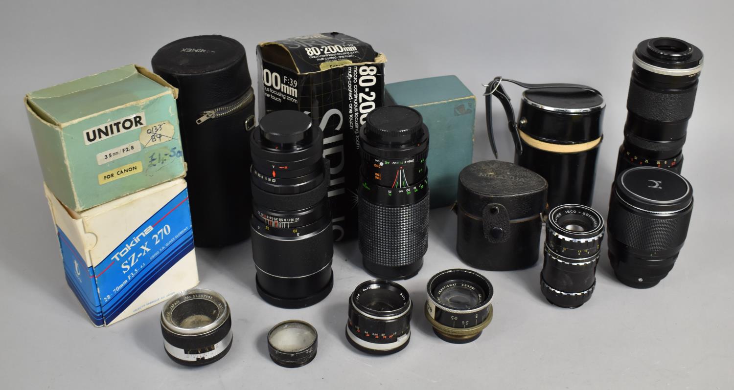 A Collection of Various Camera Lenses to Include Hanimex 200mm, Panagor Tele Zoom Lens 85-205mm