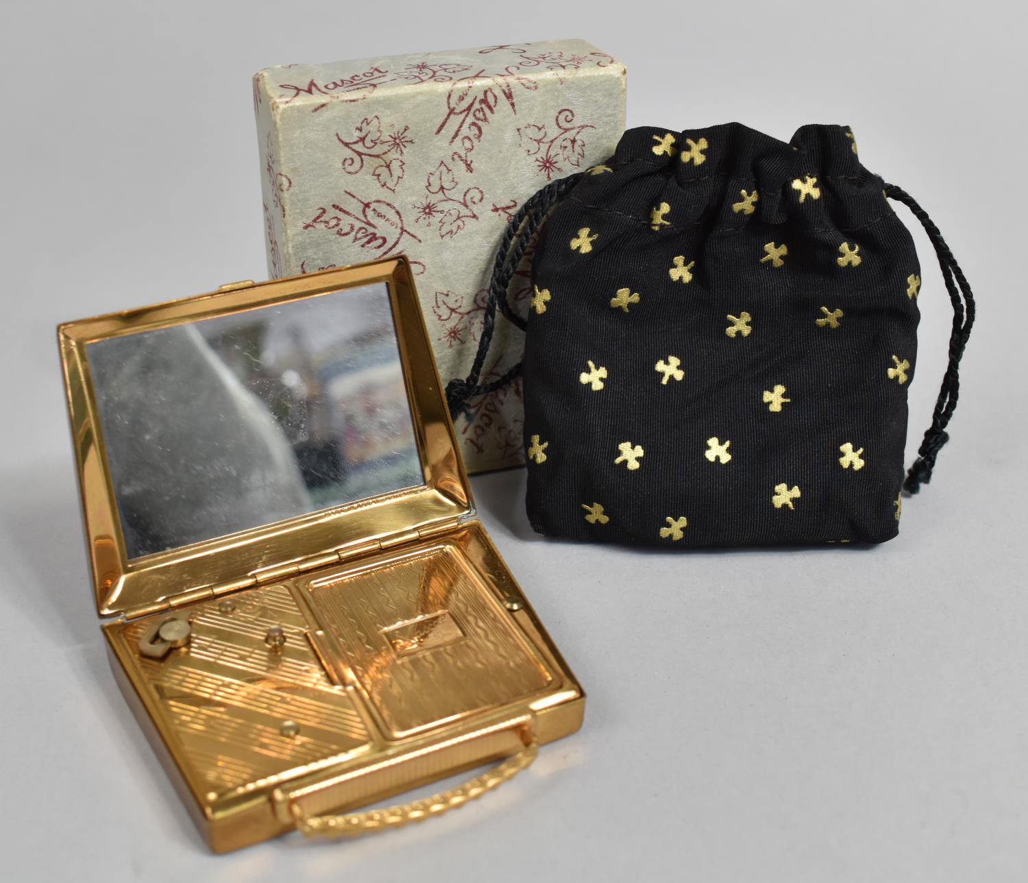 A Mid 20th Century Thorens Musical Powder Compact in the Form of a Ladies Handbag Playing Two - Image 2 of 2