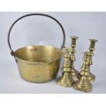 A Vintage Brass Jam Kettle and Two Pairs of Brass Candlesticks