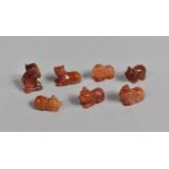 A Collection of Seven Carved Chinese Carnelian Beads in the form of Animals