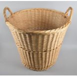 A Modern Wicker Two Handled Log Basket, 46cm Diameter