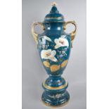 A Continental Ceramic Pedestal Vase and Cover of Urn Form Decorated with Hand Painted Floral