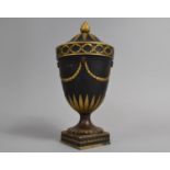 A 19th Century Wedgwood Bronzed Basalt Pedestal Vase and Cover Decorated with Swags Draped From Rams