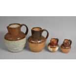 A Collection of Four 19th/20th Century Glazed Stoneware Jugs all Decorated in Relief with