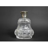 A Large Cut Glass and Silver Topped Perfume Bottle of Waisted Form, Complete with Inner Stopper,