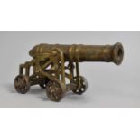 A Late 19th/Early 20th Century Bronze Model of a Naval Cannon, 20cms Long