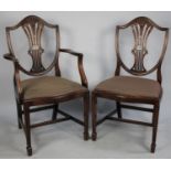 A Set of Eight Wheatsheaf Shield Back Dining Chairs to include Two Carvers