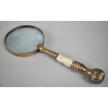 A Modern Brass and Mother of Pearl Handled Desktop Magnifying Glass, 25.5cms Long