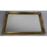 A Modern Ornate Rectangular Gilt Framed Wall Mirror, 107cm x 76cm