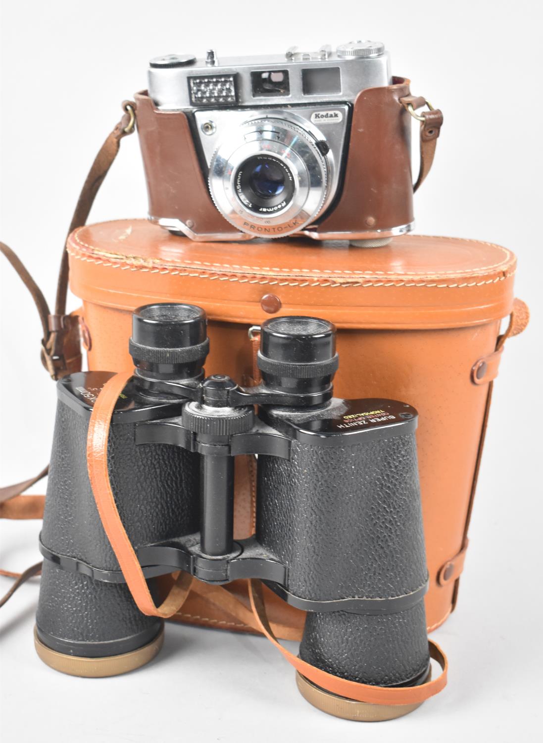 A Leather Cased 10x50 Field Binoculars Together with a Cased Kodak Retinette 18 Camera