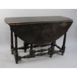 A 19th Century Oak Gate Leg Oval Top Dining Table, 126cm wide