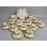 An Edwardian Floral Pattern Tea Set of Wrythen Form in the Wileman Style to Comprise Cups,