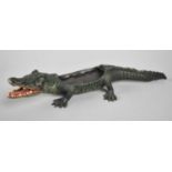 A Reproduction Cold Painted Bronze Novelty Match Holder in the Form of a Crocodile, 22cms Long