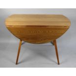 A Vintage Ercol Drop Leaf Dining Table