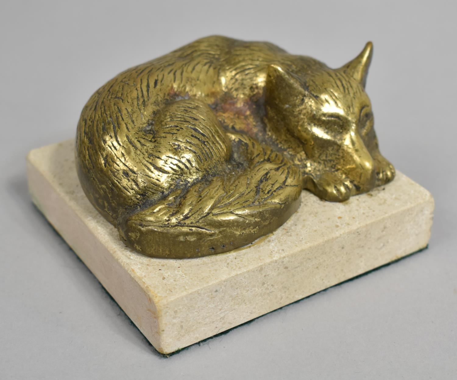 A Cast Brass Model of a Curled Sleeping Fox on Stone Plinth, 10cms Square