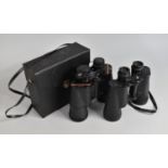 Two Pairs of 10x50 Binoculars, One with Case