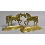 A Pair of Late Victorian Brass Fireside Ornaments or Doorstops in the Form of Horses, 24cms Wide