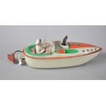 A Vintage Tin Plate Clockwork Model of a Speed Boat by Muhlhauser, 19cms Long