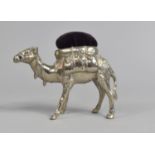 A Novelty Metal Pin Cushion in the Form of a Laden Camel, 10cms Long
