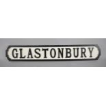 A Modern Wooden Sign in the Form of a Victorian Street Sign, "Glastonbury", 84.5cms Wide