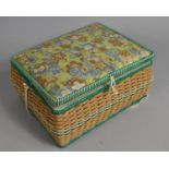 A Mid 20th Century Wicker Sewing Basket with Contents